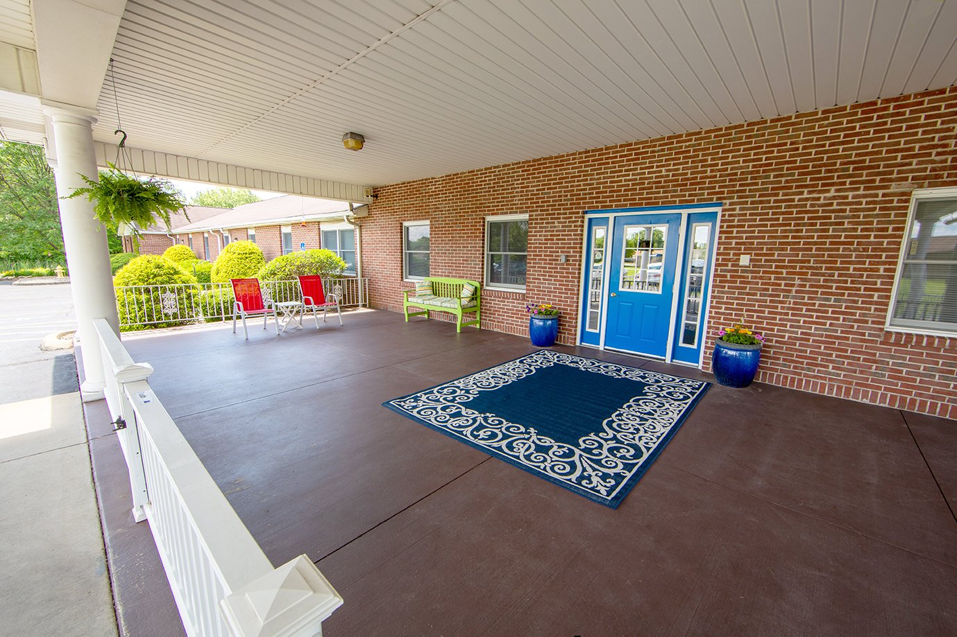 Covered porch with seating at Gracewoods